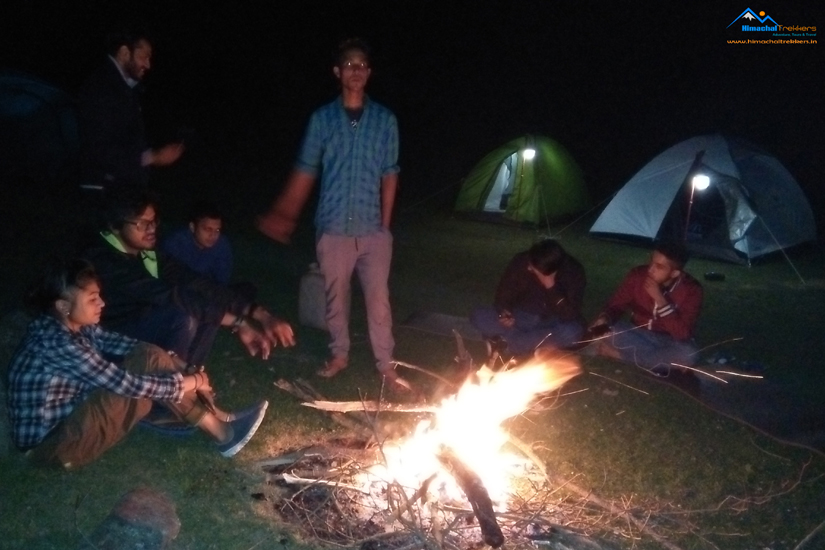 enjoying bonfire at prashar
