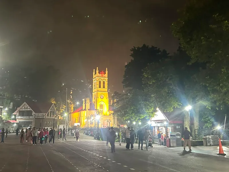 Illuminated Christ Church on The Ridge Shimla bustling with evening tourists